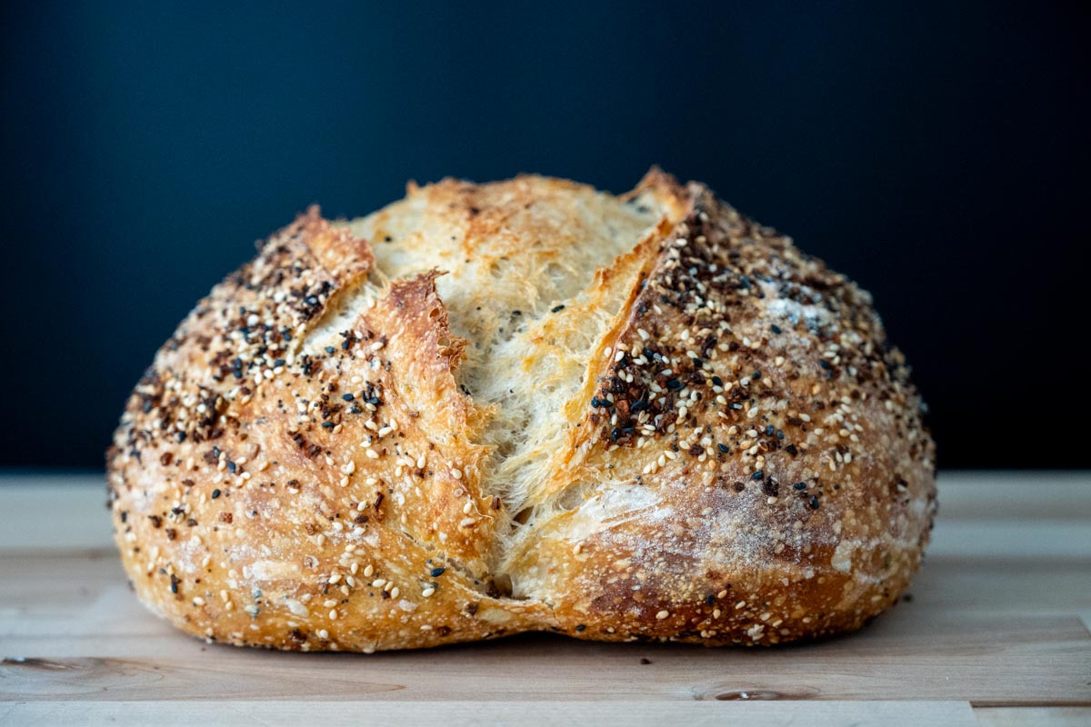 a loaf of sourdough everything bagel seasoning bread